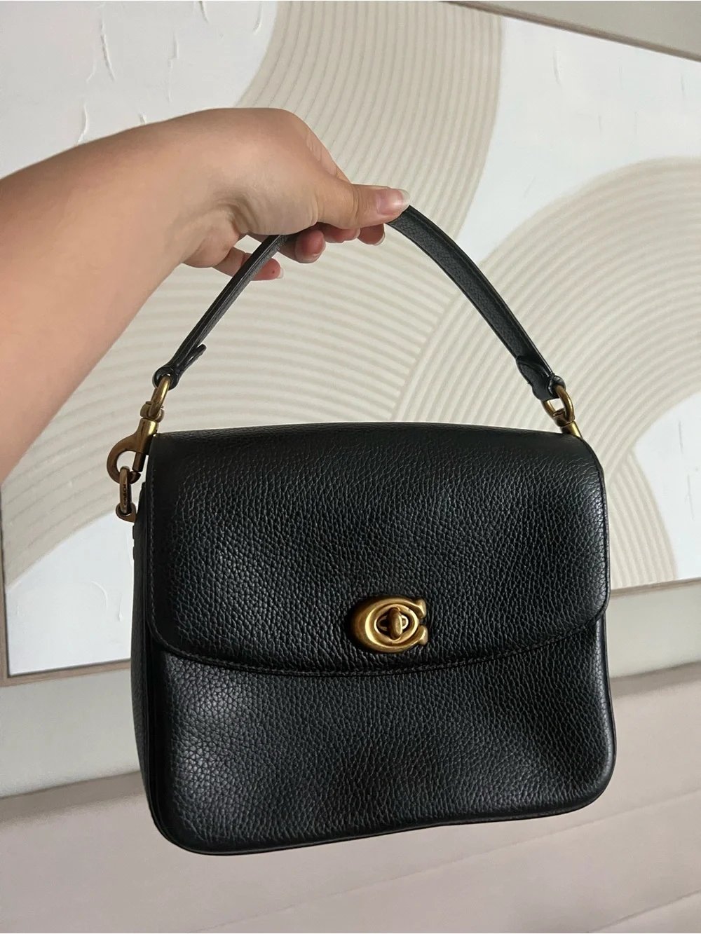 Coach Cassie Black Pebbled Leather Top-Handle Bag with Gold Turnlock